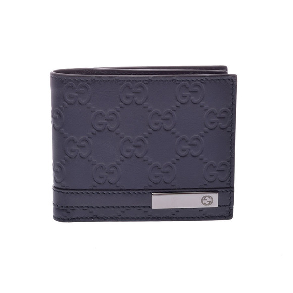 Gucci Handbags - Gucci Guccissima bifold wallet blue leather